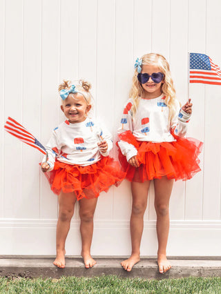 Kid's patriotic popsicle sweatshirt by Brokedown Clothing, featuring colorful patriotic design on a cozy sweatshirt for children.