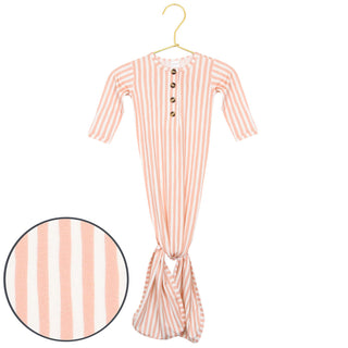 Lou Lou and Company Knotted Gown - Brynn
Pink and white striped baby romper on a hanger with close-up of fabric pattern.