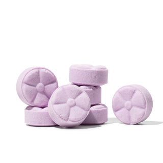 The Lavish Goat Shower Steamers Box - Slumber: Lavender
Purple bath bombs stacked on a white background