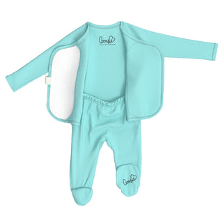 Bonsie Footie - Tiny Tide
A baby sleep suit in mint green, featuring a footed one-piece base with integrated mittens and a detachable outer layer, displayed on a solid white background.
