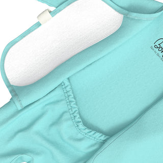 Bonsie Footie - Tiny Tide
Close-up of a mint green baby bodysuit or onesie with a white padded shoulder support pad and a small black script logo on the chest.