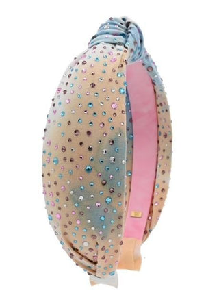 Bari Lynn Cotton Jeweled Knot Headband - Pastel Tie Dye
Decorative headband with colorful gemstones and a pink ribbon on a white background