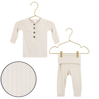 Lou Lou and Company Ribbed Top and Bottoms - Cove
Baby outfit with long-sleeve shirt and pants on hangers against a white background