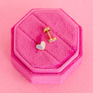Pierced Co. Heart Duo Earrings
Heart-shaped earrings in a pink jewelry box on a pink background