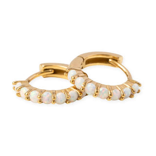 Pip Pop Post Earrings - Opal Hoop
A pair of gold huggie hoop earrings adorned with small, round white opal-like stones, shown on a clean white background.