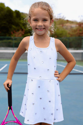 Lavender Lola & The Boys Heart Scuba Tennis Dress displayed on a hanger, showcasing the stylish sleeveless design and heart pattern.