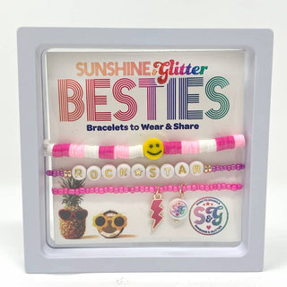 Sunshine & Glitter Besties Bracelet Set featuring colorful charm bracelets with "Rockstar" design on a white background.