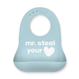 Bella Tunno Wonder Bib - Mr. Steal Your Heart
A light blue silicone baby bib with a white printed graphic that reads 'mr. steal your heart' and the brand name 'BELLA TUNNO' underneath, shown on a plain white background.