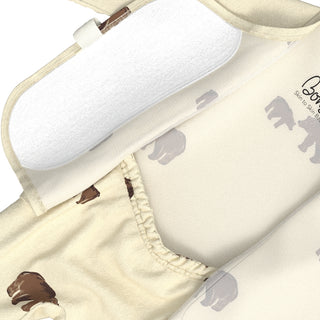Bonsie Footie - Mama Bear
Close-up of a baby sleep sack or wearable blanket in cream fabric with soft gray and brown animal silhouettes, plus a white padded neck support insert.