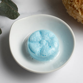 The Lavish Goat Soothe Eucalyptus Mint Shower Steamers box, bath and body product with refreshing eucalyptus and mint scents.