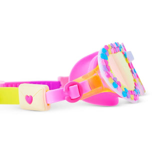Bling2o Color Me Smitten Candy Heart Swim Goggle
Colorful children's goggles with a heart-shaped button on a white background