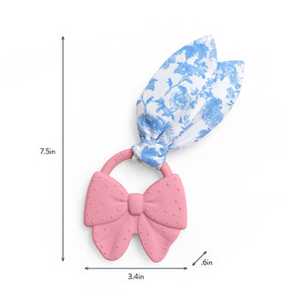 Itzy Ritzy Crinkle Crew™ Bow teether with soft fabric and crinkle sounds, designed for soothing babies and teething comfort.