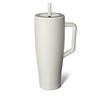 Brumate Era 40oz - Dune
White ceramic mug with handle and straw lid on a white background
