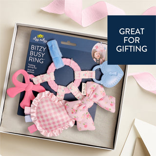 Itzy Ritzy Bow Bitzy Busy Ring activity toy for babies with colorful rings and a bow design, designed to engage and entertain.