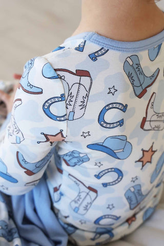 Caden Lane Rodeo Dreams Blue two-piece pajama set for kids, featuring soft fabric and playful rodeo-themed print.
