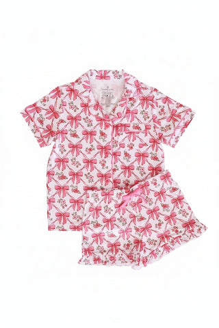 Caden Lane Bow Besties two-piece short lounge pajama set with a comfortable top and shorts, featuring playful bow details.