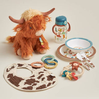 Itzy Ritzy Itzy Bistro™ Dining Set - Giddy Up
Collection of children's items including a plush toy, bib, sippy cup, and plates on a light background