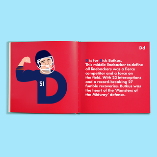 Football Legends Alphabet Hardcover Book
Open book with a red background featuring an illustration of a football player and text on a blue background