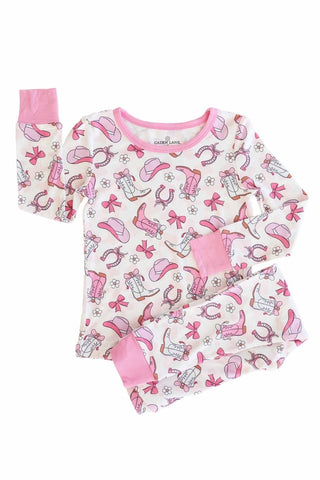 Caden Lane Rodeo Dreams Pink two-piece pajama set for girls with playful rodeo print and soft fabric, perfect for bedtime comfort.