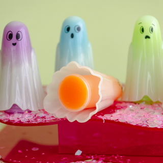 Jollity & Co Trick or Treat Street Ghost Slime
Three colorful ghost figurines with a pink flower and orange center on a red surface.