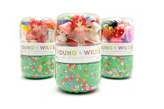 The Gardening Grab & Go Dough Jars come with one jar of our amazing all-natural sensory dough and a separate screw-on jar filled with everything you need to make the cutest floral scene!
Three small jars with colorful figurines and 'Young + Wild!' label on a white background