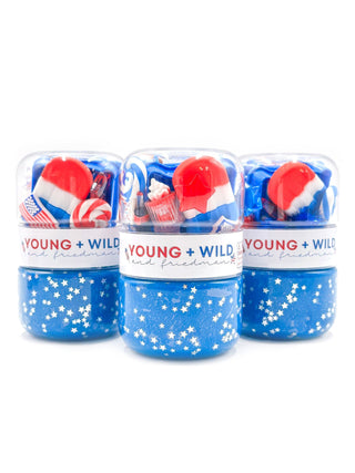 Young Wild and Friedman Grab & Go Dough Jar - Fourth of July
Three containers of 'Young + Wild' candy with red, white, and blue packaging on a white background.