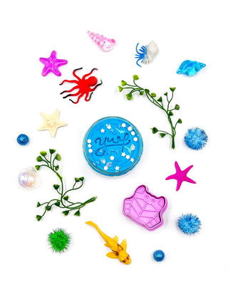 Young Wild and Friedman Grab & Go Dough Jar - Ocean
Colorful sea-themed toys and accessories on a white background