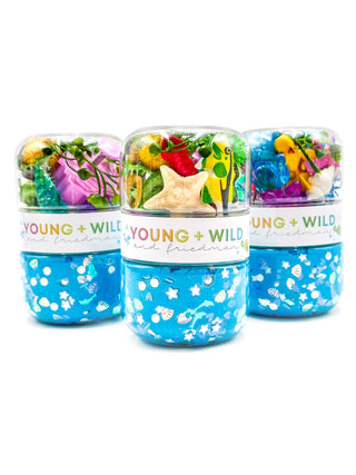Young Wild and Friedman Grab & Go Dough Jar - Ocean
Three colorful jars with animal illustrations on a white background, labeled 'Young & Wild'.