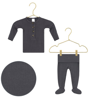 Lou Lou and Company Ribbed Top and Bottoms - Hudson
Dark gray baby shirt and pants set on hangers with a close-up of fabric texture.