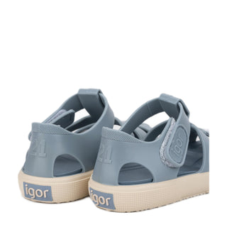 Igor Bay in Oceano / Ocean
Pair of blue sandals with beige soles on a white background