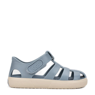Igor Bay in Oceano / Ocean
Blue sandal with beige sole on a white background