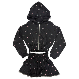 FBZ Ditsy Floral Black Ruffle Trim Zip Hoodie
A black two-piece girls' outfit set featuring a cropped zip-up hoodie and a matching ruffled skirt, both decorated with a small pink and white floral pattern.