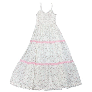 FBZ Pink Rose Smocked Maxi Dress by Flowers By Zoe, featuring a flowy silhouette and floral rose print, shown on a model.
