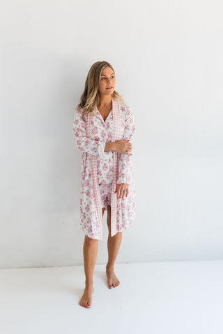 In My Jammers Blush Rose Garden Women's Robe
Woman wearing a floral nightshirt against a white background