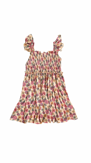 In My Jammers London floral smocked twirl dress for toddlers, featuring colorful floral print and a playful, twirling design.