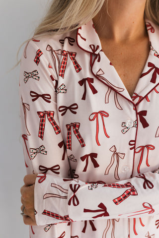 In My Jammers Merry Little Bows Women’s Set
White pajama top with red and brown bow pattern on a plain background