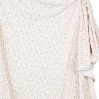 Lou Lou and Company Swaddle Blanket - Kit
Close-up of a beige fabric with subtle patterns on a white background