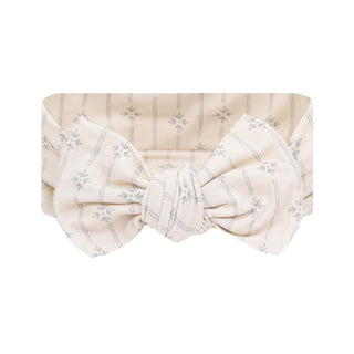 Lou Lou and Company Headband - Kit
Headband with a large bow on a white background