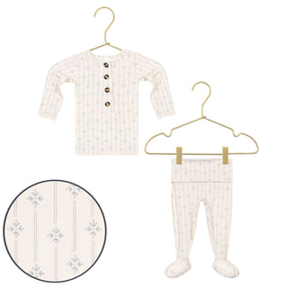 Lou Lou and Company Top and Bottoms - Kit
Baby outfit with long-sleeve top and pants on hangers against a white background