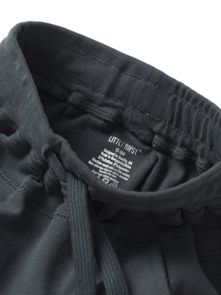 Little Bipsy Jogger - Shadow
Close-up of a black hoodie with 'Little Bipsy' label on a light gray background