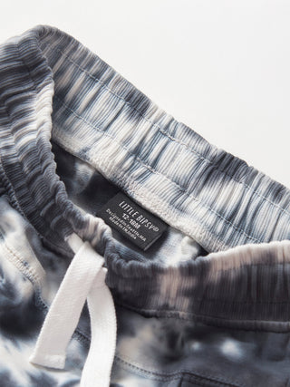 Little Bipsy Marble Jogger - Blue
Close-up of a tie-dye robe with a brand label on a white background