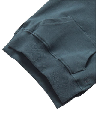  Little Bipsy Pocket Pullover - Night Fall
Close-up of a dark blue sweatshirt with a pocket on a light gray background
