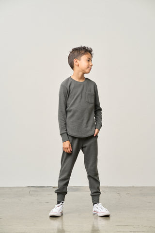 Little Bipsy Waffle Top - Shadow
Child wearing a gray outfit standing against a white background