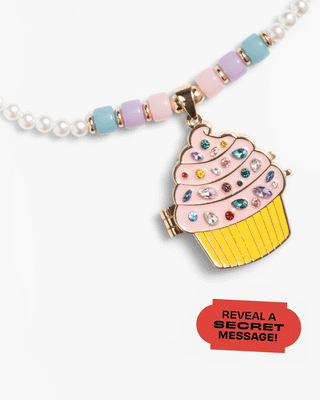 Super Smalls Cupcake Cutie Lipgloss Locket necklace with a cute cupcake design, featuring a playful and charming accessory.
