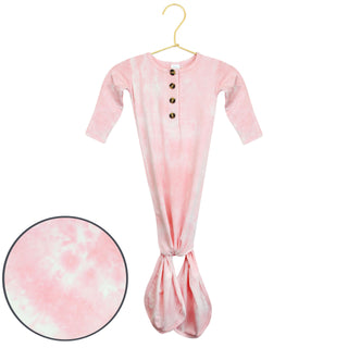 Lou Lou and Company Knotted Gown - Emily
Pink tie-dye baby onesie on a hanger with a close-up of the fabric texture.