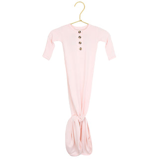 Lou Lou and Company Knotted Gown - Sophie
Pink baby dress on a hanger against a white background