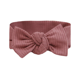 Lou Lou and Company Ribbed Headband - Marjorie
Pink headband with a bow on a white background