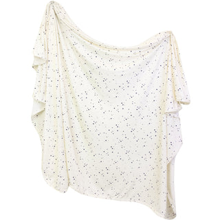 Lou Lou and Company George swaddle blanket with soft fabric and playful pattern for newborns and infants.