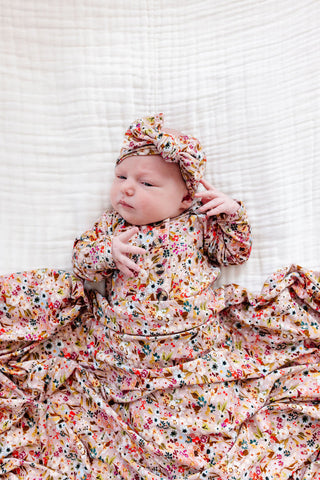 Lou Lou and Company newborn headband bundle featuring a soft swaddle blanket and a Penelope headband, perfect for newborn photos.
