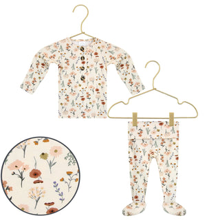 Lou Lou and Company Top and Bottoms - Rachel
Floral-patterned baby outfit with top and pants on hangers against a white background.